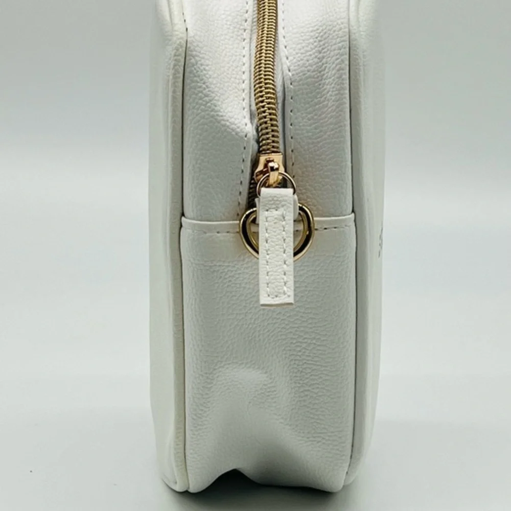 STILA white cosmetic crossbody bag